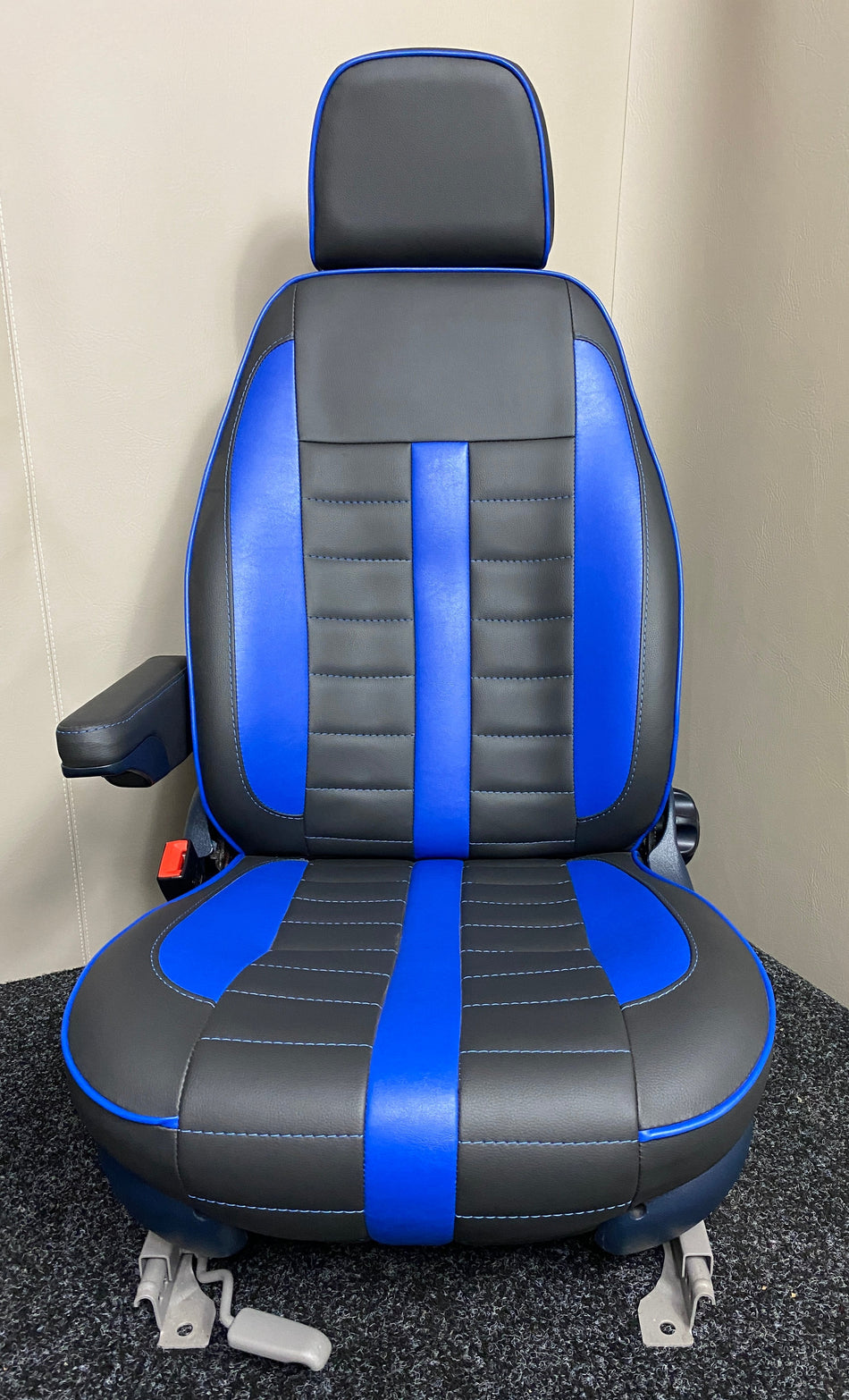 MK1 Replacement Swivel Captain Seat in black leatherette with blue centre panel, piping and inserts, one armrest and dark blue trim.