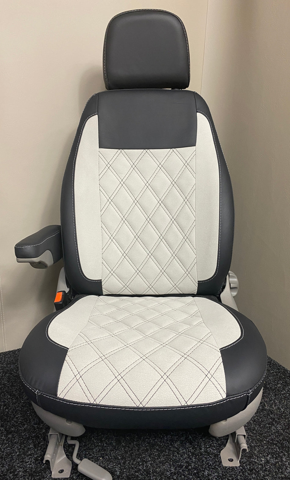 MK1 Replacement Captain Swivel Seat in black Nappa leather with white microfibre centre panel, with one armrest.