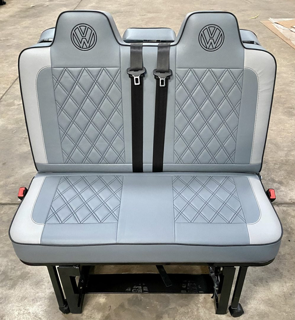 Rock and roll bed VW T4 T5 T6 M1 tested gas strut M1 legged in mid grey leatherette with Bentley cross stitching, light grey edge, black piping and VW logos.