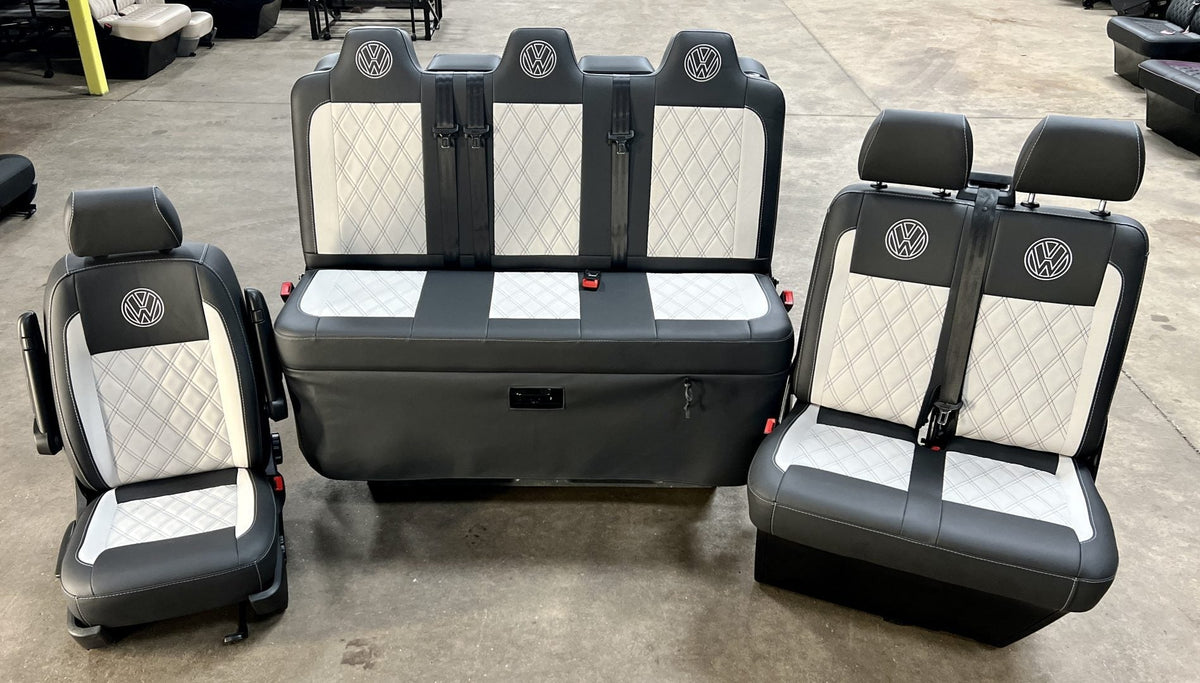 Rock and roll bed VW T5 T6 Full width M1 tested & front seats in black leatherette, with grey faux suede and VW logos.