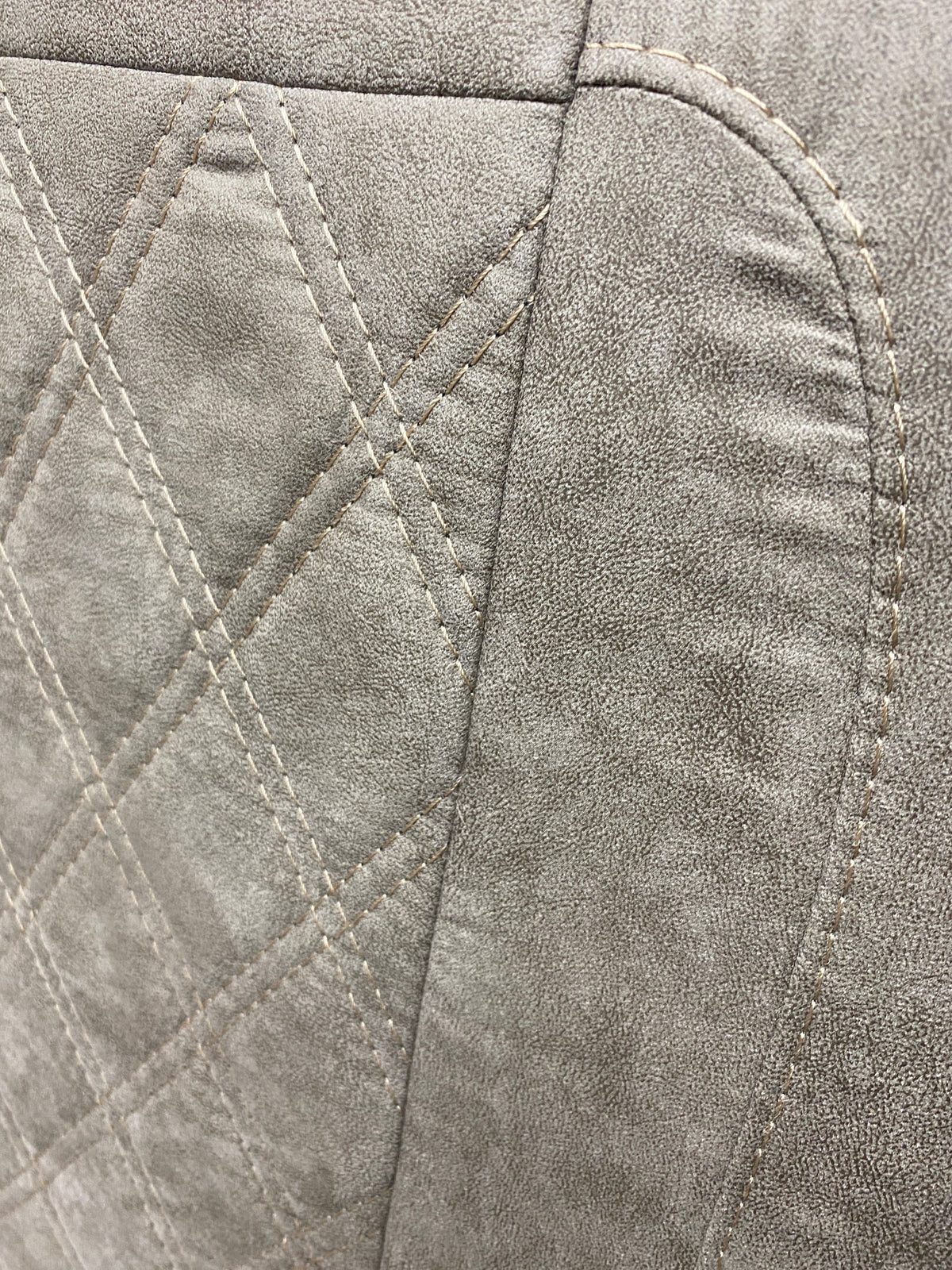 Rock & Roll Bed M1 Tested 3/4 Width, close-up of beige faux suede backrest with detailed Bentley stitch pattern.
