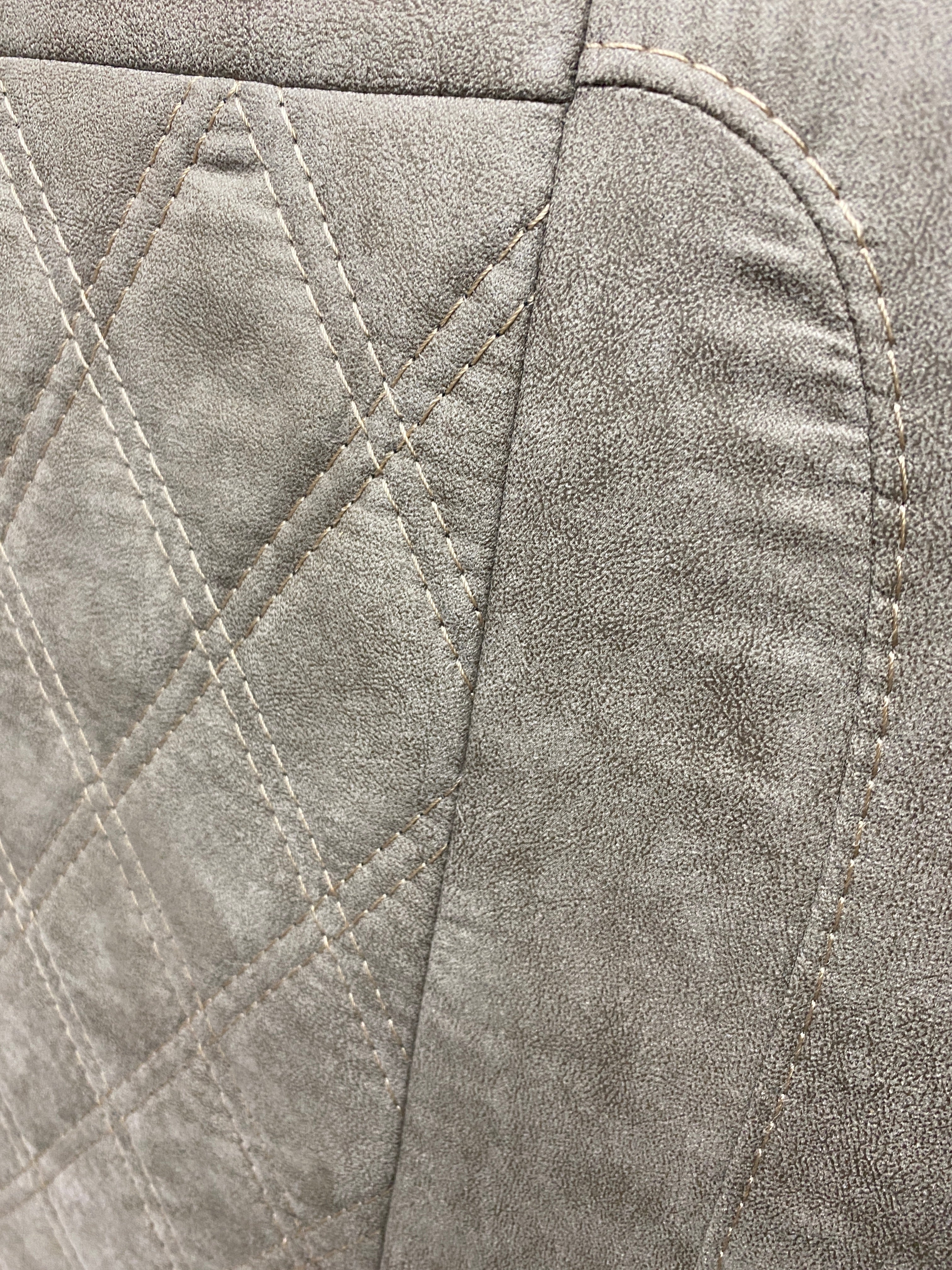 Rock & Roll Bed M1 Tested 3/4 Width, close-up of beige faux suede backrest with detailed Bentley stitch pattern.