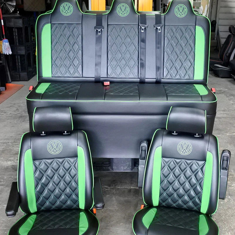 Rock & Roll Bed T4 - Front Seats & Full Size M1 in black upholstery with green inserts, stitching and VW logos.