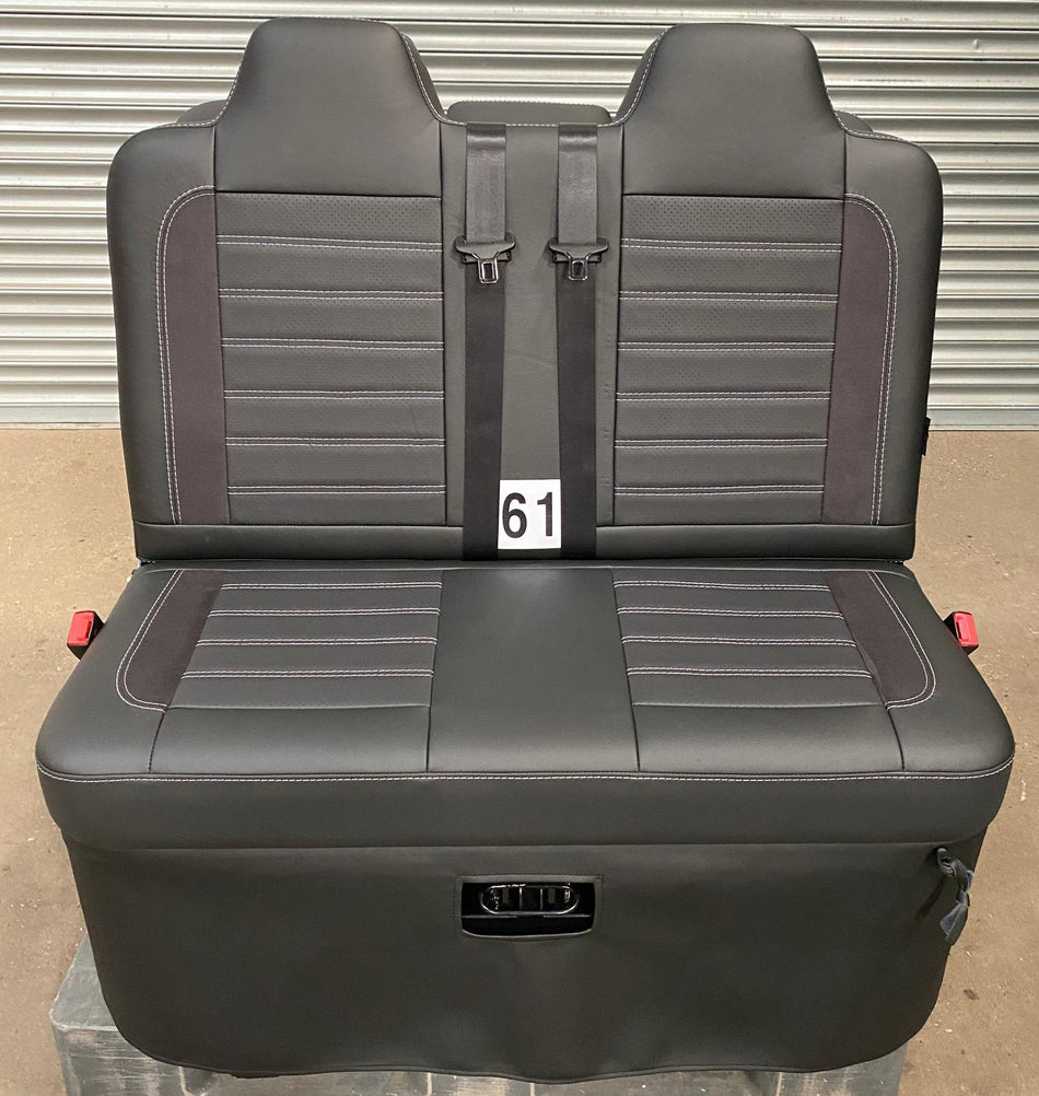 M1 tested 3/4 legless gas-assisted rock and roll bed for VW T4 T5 T6 Crafter. Black leather, perforated centre panel, Alcantara inserts, grey stitching.