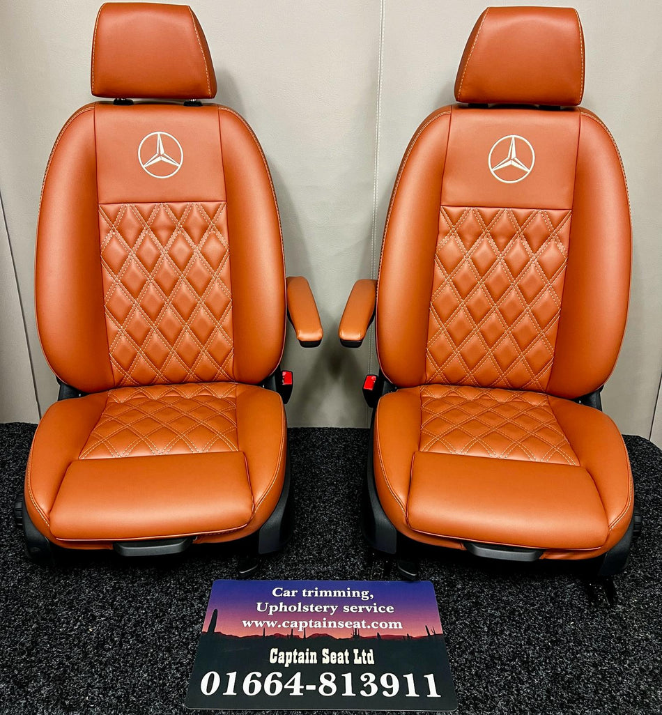Mercedes Sprinter Single Front Seats in brown leatherette with cream Bentley stitch pattern and Mercedes logo.