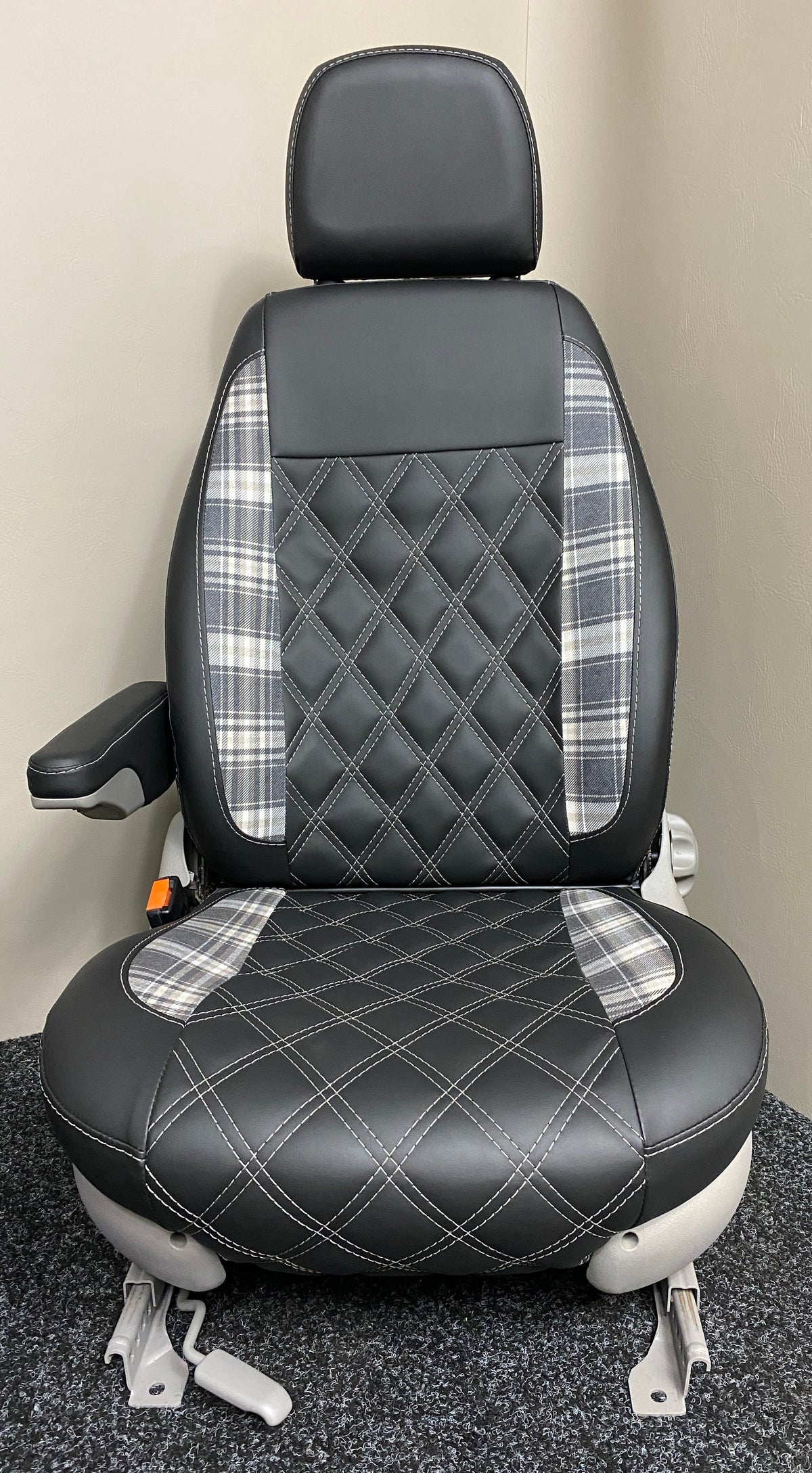 MK1 Replacement Swivel Captain Driver Seat in black leatherette with tartan inserts, white Bentley cross stitching, and single armrest.
