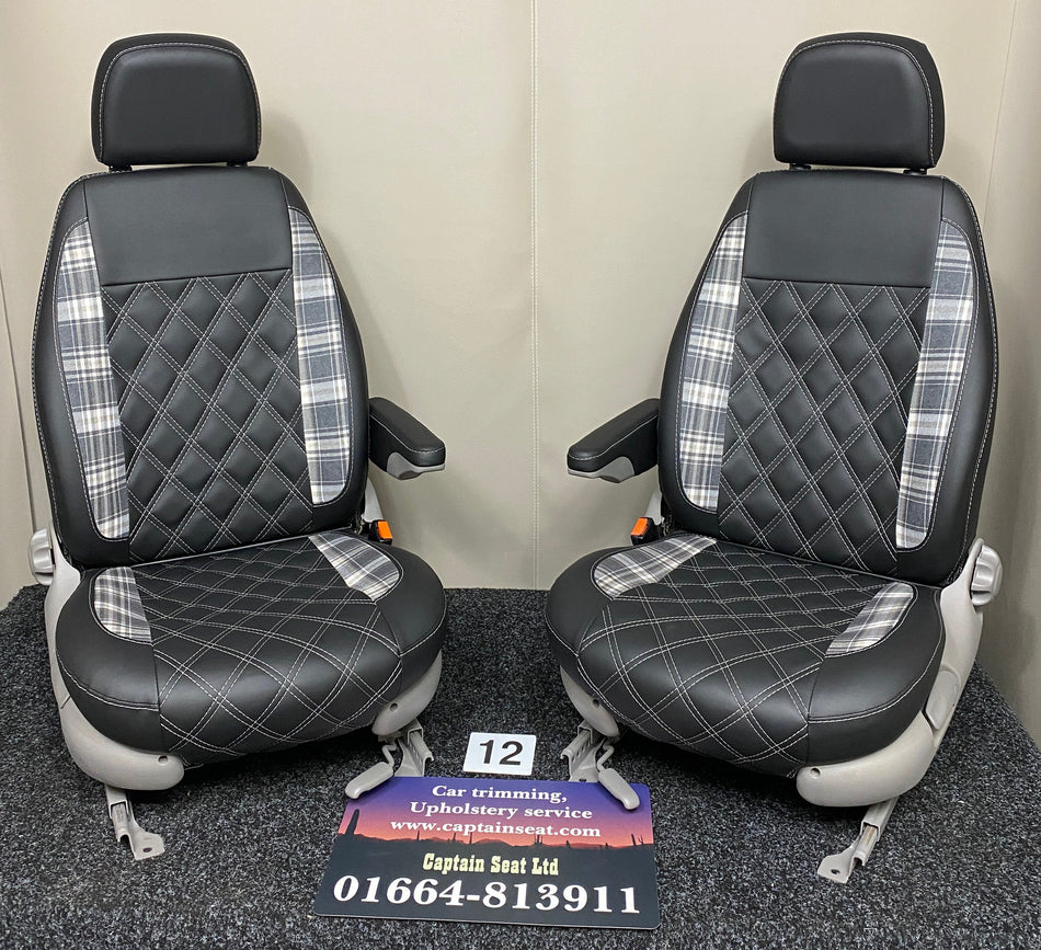 MK1 Replacement Swivel Captain Seats in black leatherette with tartan inserts, white Bentley cross stitching, and light grey trim.