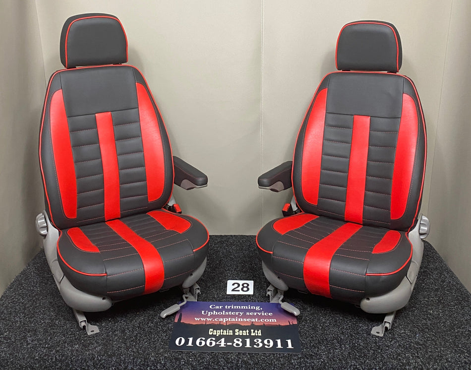 MK1 Replacement Swivel Captain Seats in black leatherette with red leatherette inserts, wide horizontal stitching, red piping, and light grey plastic trim.