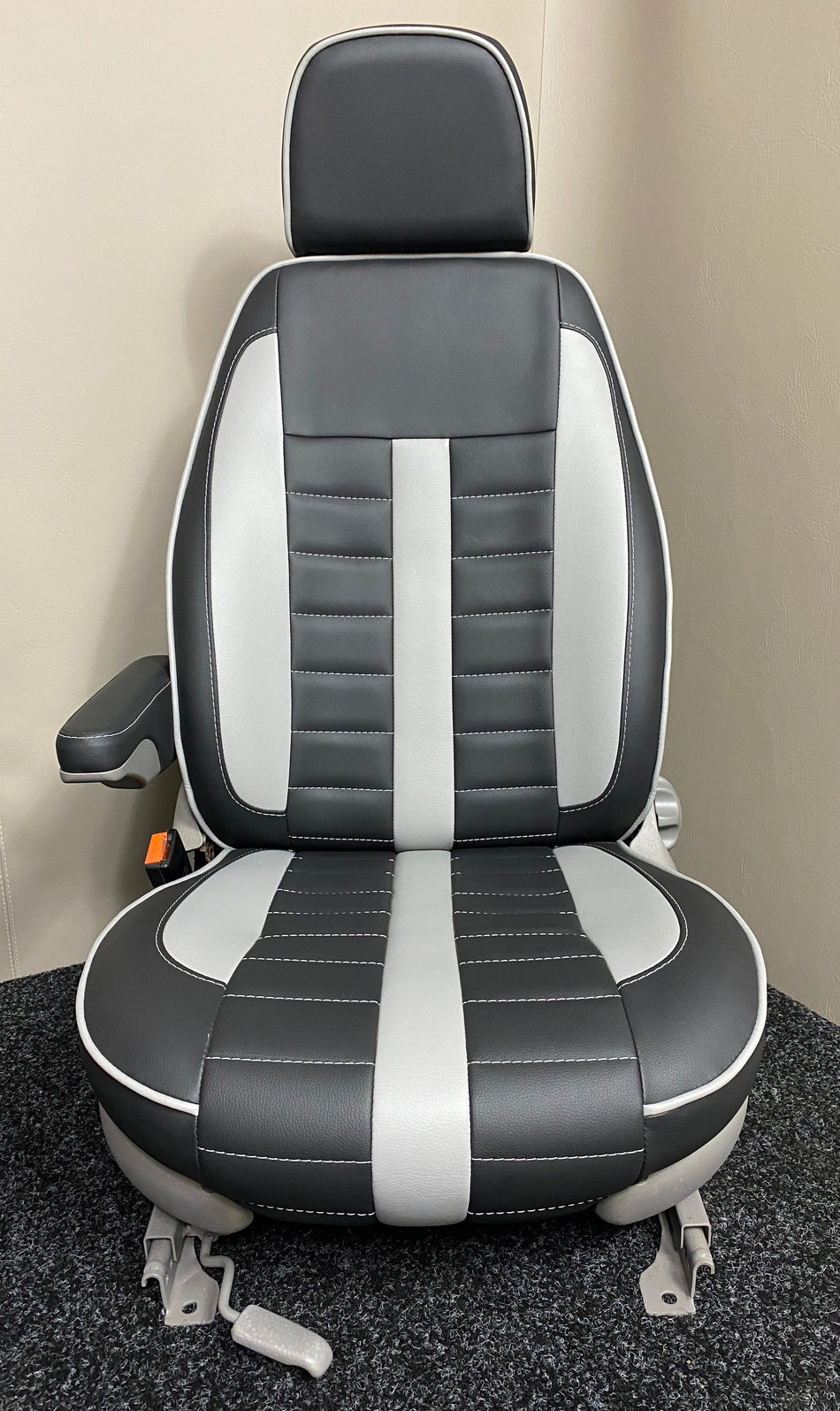 MK1 Replacement Swivel Captain Seat in black leatherette with grey inserts and piping, light grey trim, horizontal stitching and one armrest.