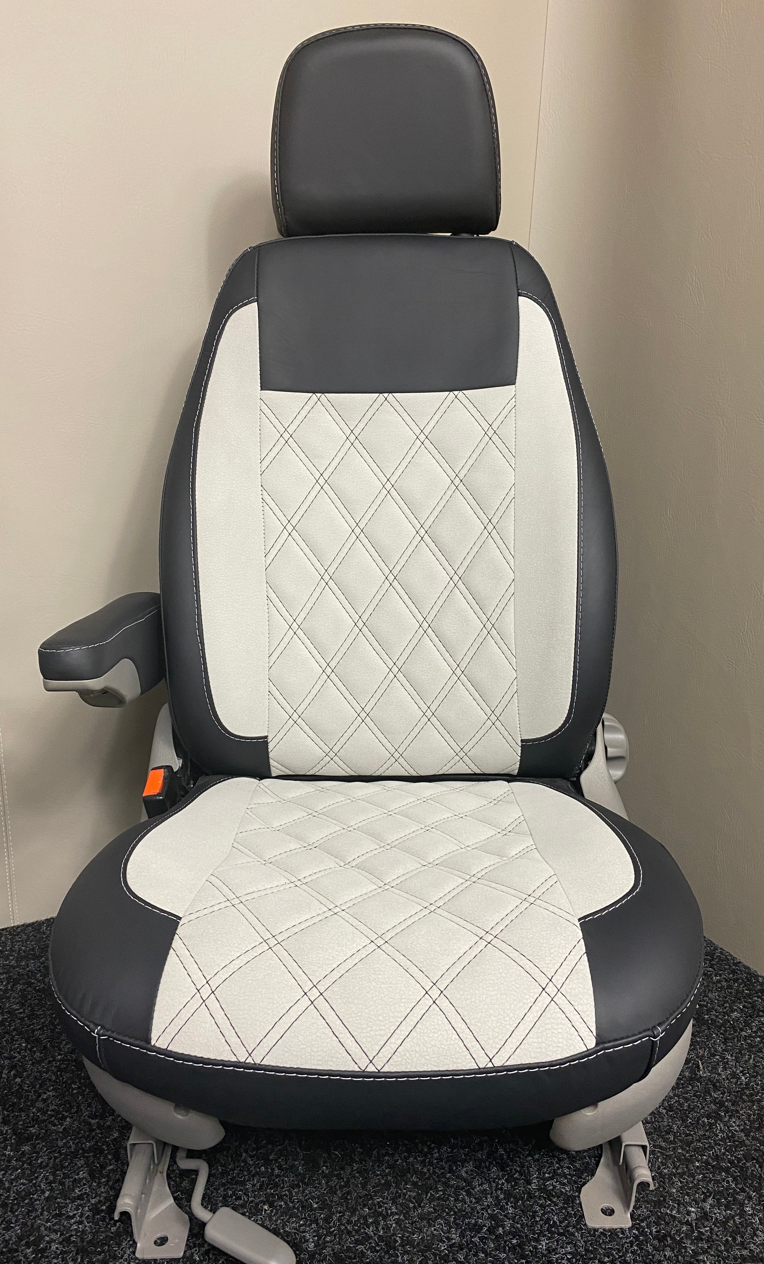 MK1 Replacement Captain Swivel Seat in black Nappa leather with white microfibre centre panel, with one armrest.