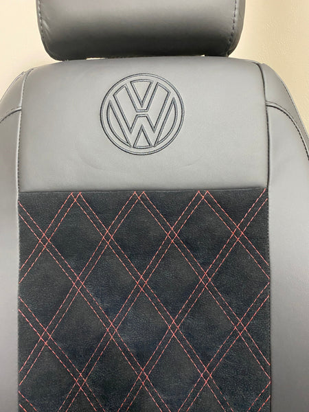 MK1 Replacement Captain Swivel Seat, close-up of backrest showing black VW logo on Nappa leather and red Bentley stitched microfibre panel.