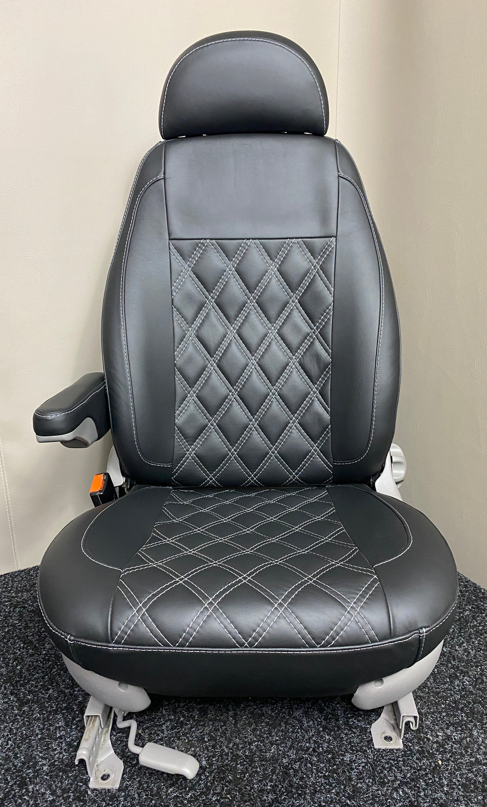 MK1 Replacement Swivel Captain Seat in black real leather with light grey Bentley stitching, light grey plastic trim, and a single armrest.