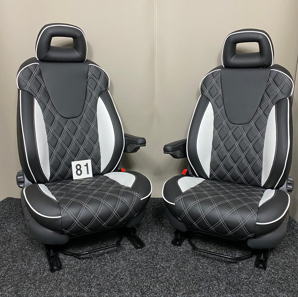 Pair of MK2 Replacement Captain Swivel Seats in black leatherette with white inserts, white piping and white diamond stitching