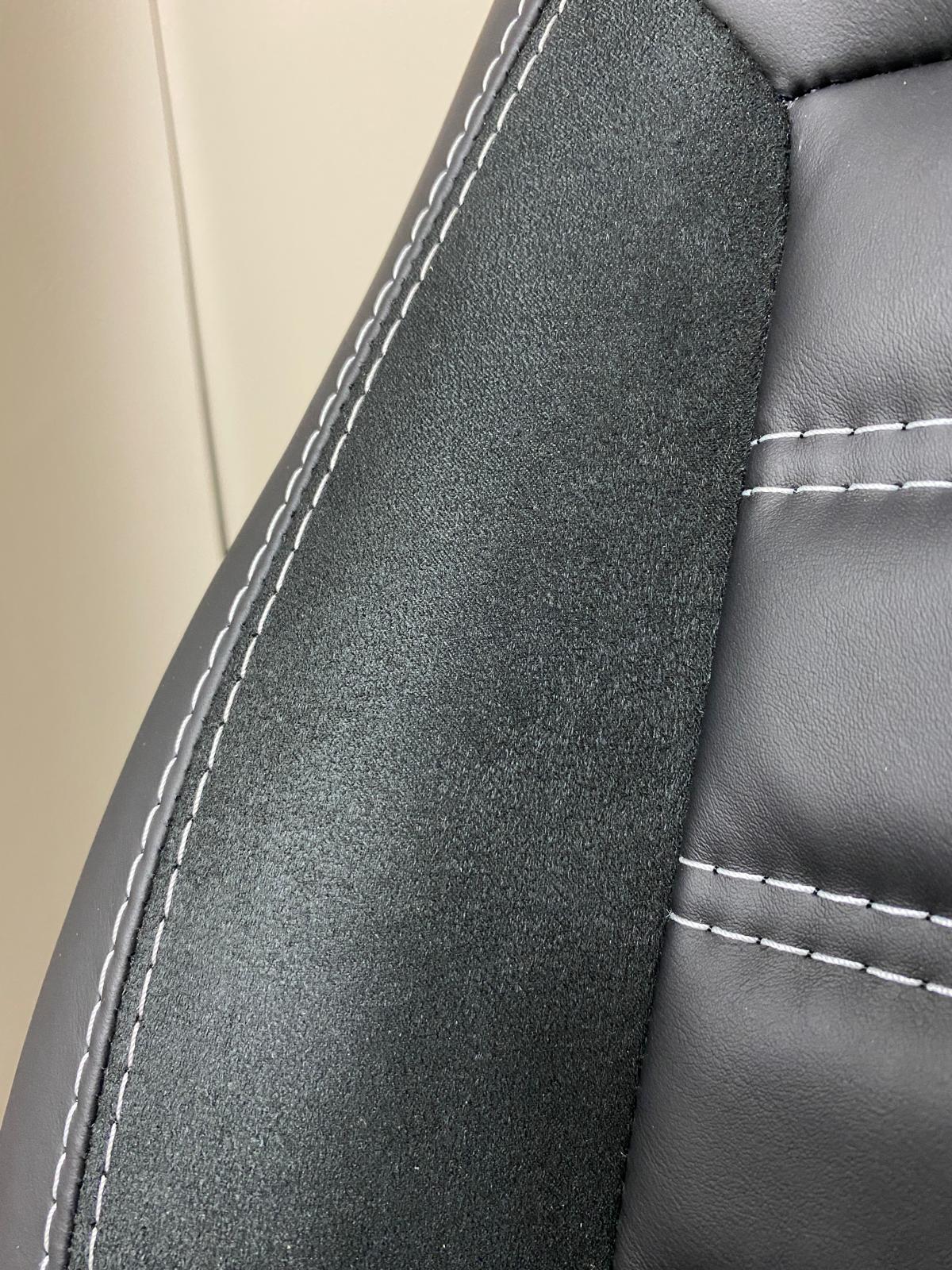 MK2 Replacement Captain Swivel Seat close-up, black Alcantara insert with white stitching