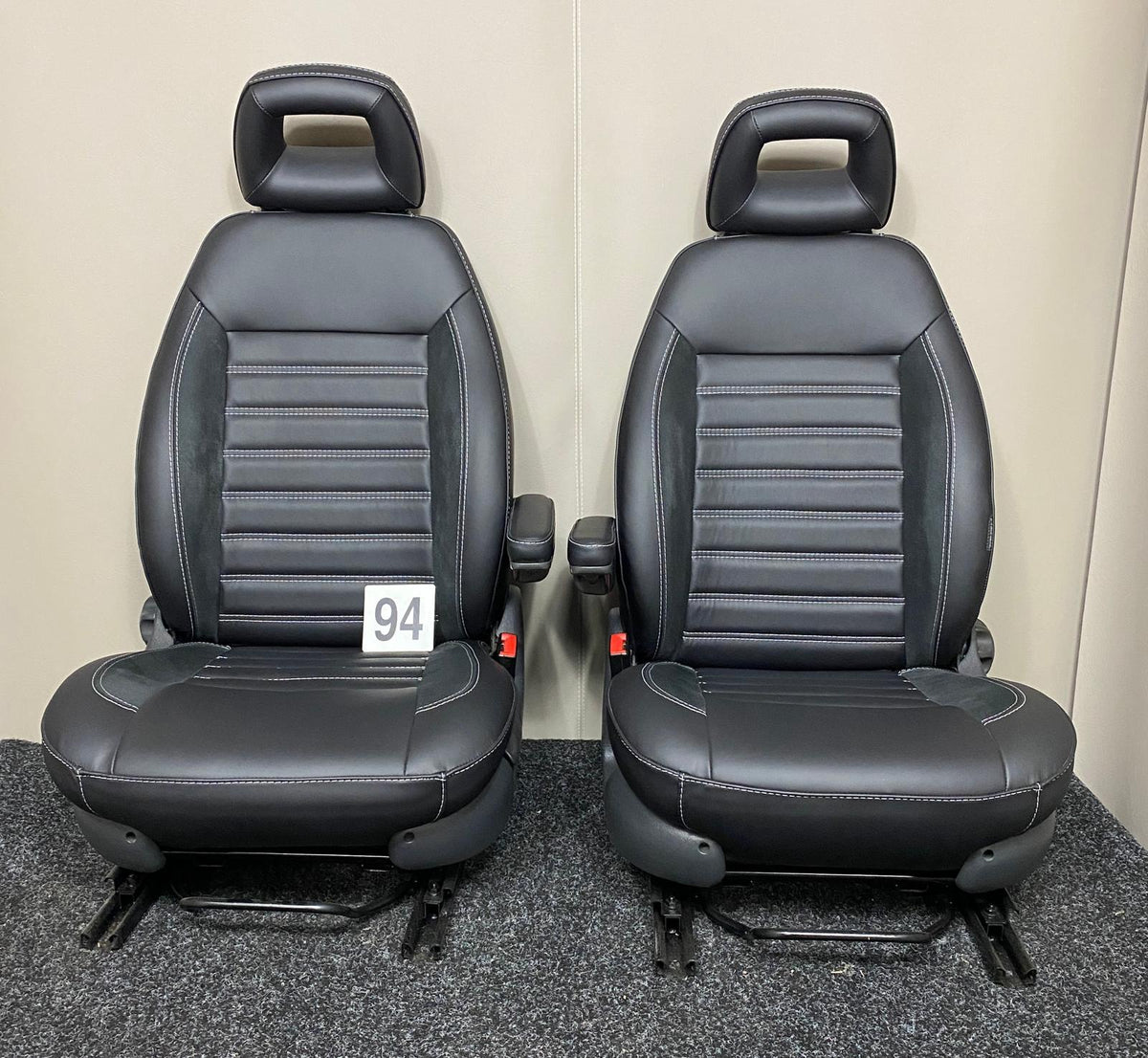 Pair of MK2 Replacement Captain Swivel Seats in black Nappa leather with black Alcantara inserts and horizontal stitching