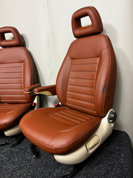 MK2 Replacement Captain Swivel Seat in brown Nappa leather with horizontal stitching, side view