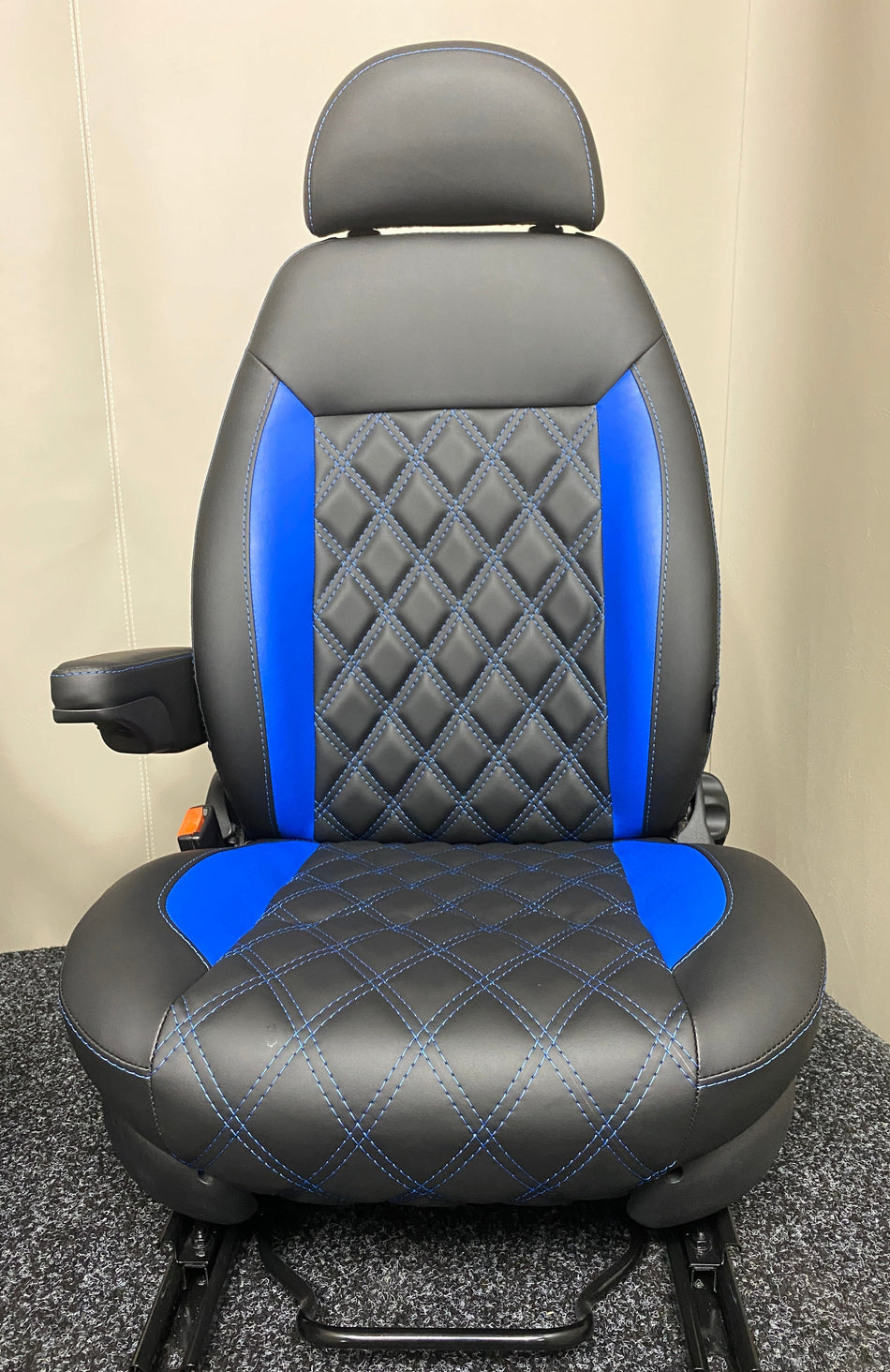 MK2 Replacement Swivel Captain Seat, front view highlighting blue inserts, one armrest and diamond-stitched black leatherette.
