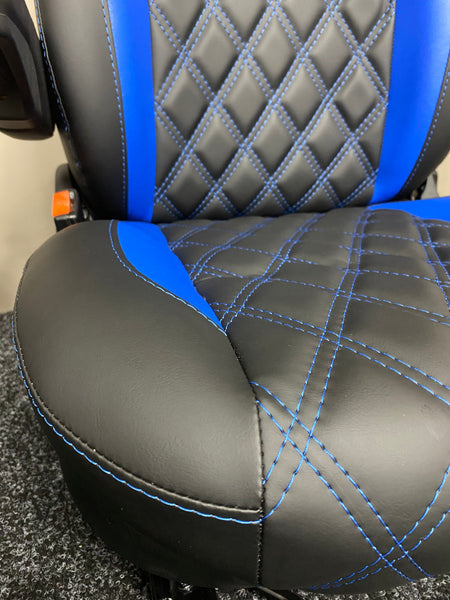 MK2 Replacement Swivel Captain Seat, close-up of seat base with blue inserts and detailed diamond stitching on black leatherette.