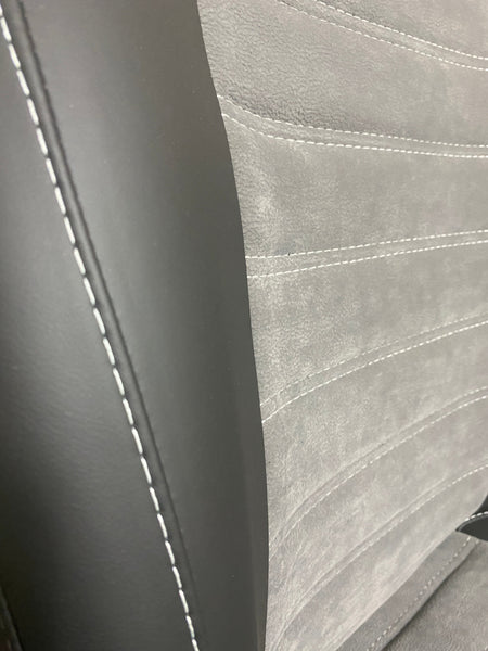 MK2 Swivel Replacement Captain Seat, close-up of the backrest with black leatherette side panel and grey faux centre panel.
