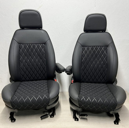 Pair of MK2 Swivel Replacement Captain Seats, front view showing matt black leatherette and black faux centre panels with Bentley stitch pattern.