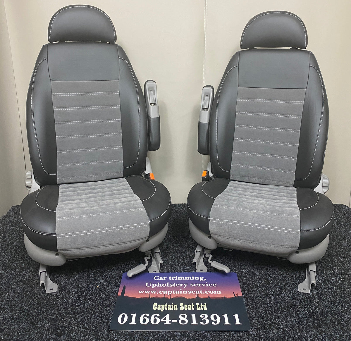 Pair of MK2 Swivel Replacement Captain Seats in matt black leatherette with light grey faux centre panels and Bentley stitch pattern.