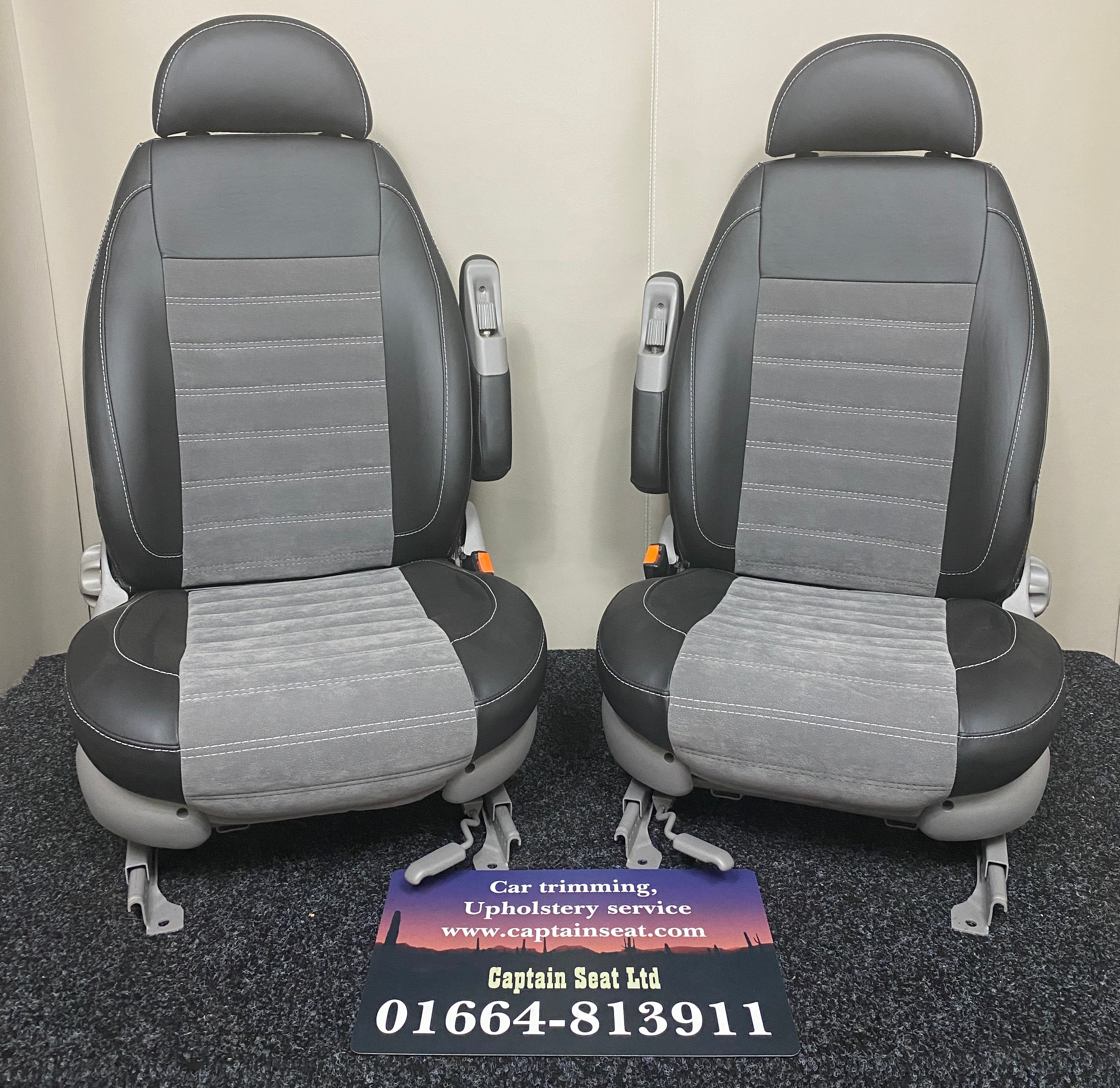 Pair of MK2 Swivel Replacement Captain Seats in matt black leatherette with light grey faux centre panels and Bentley stitch pattern.