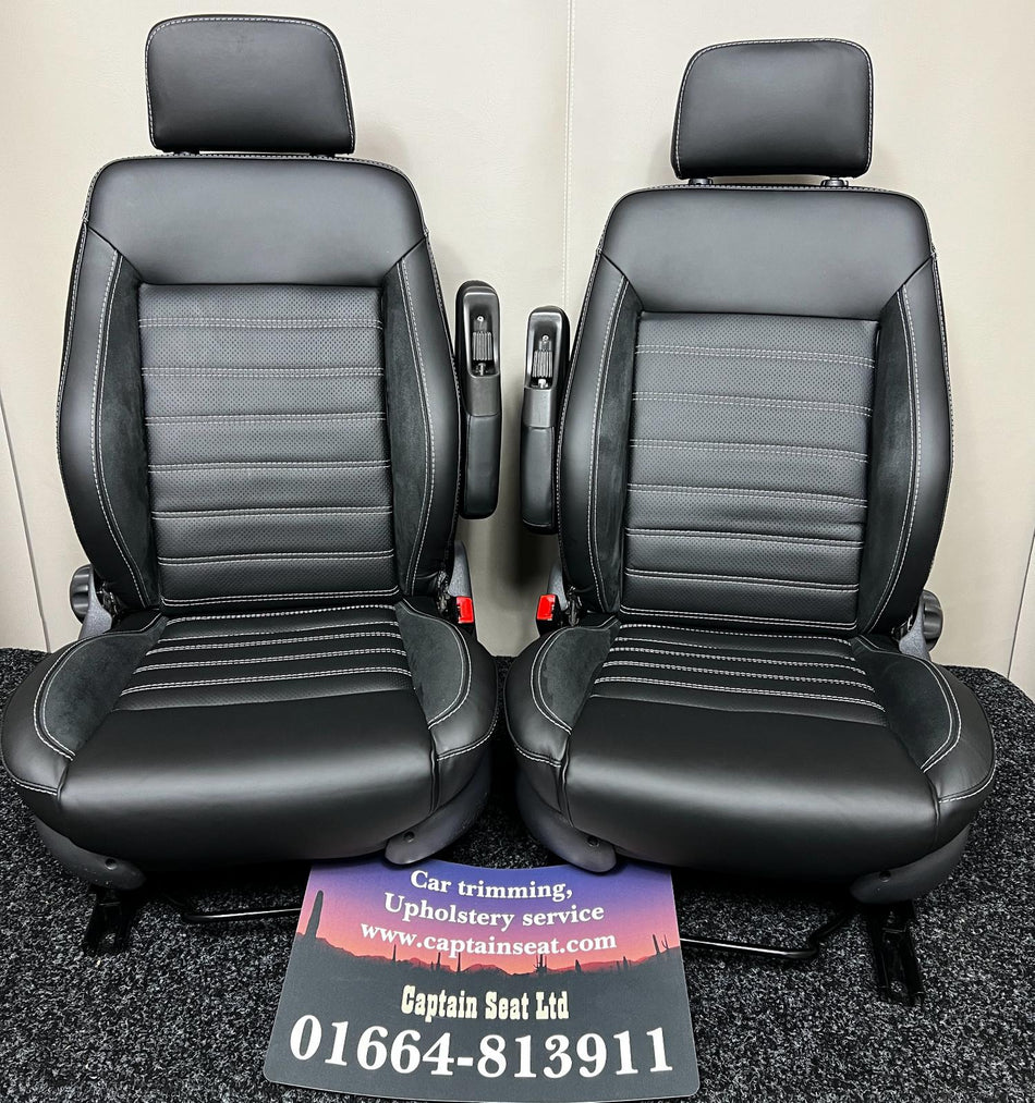 Pair of MK3 - Replacement Captain Swivel Seats in black nappa leather with white horizontal stitch pattern, perforated centre panels and Alcantara inserts.