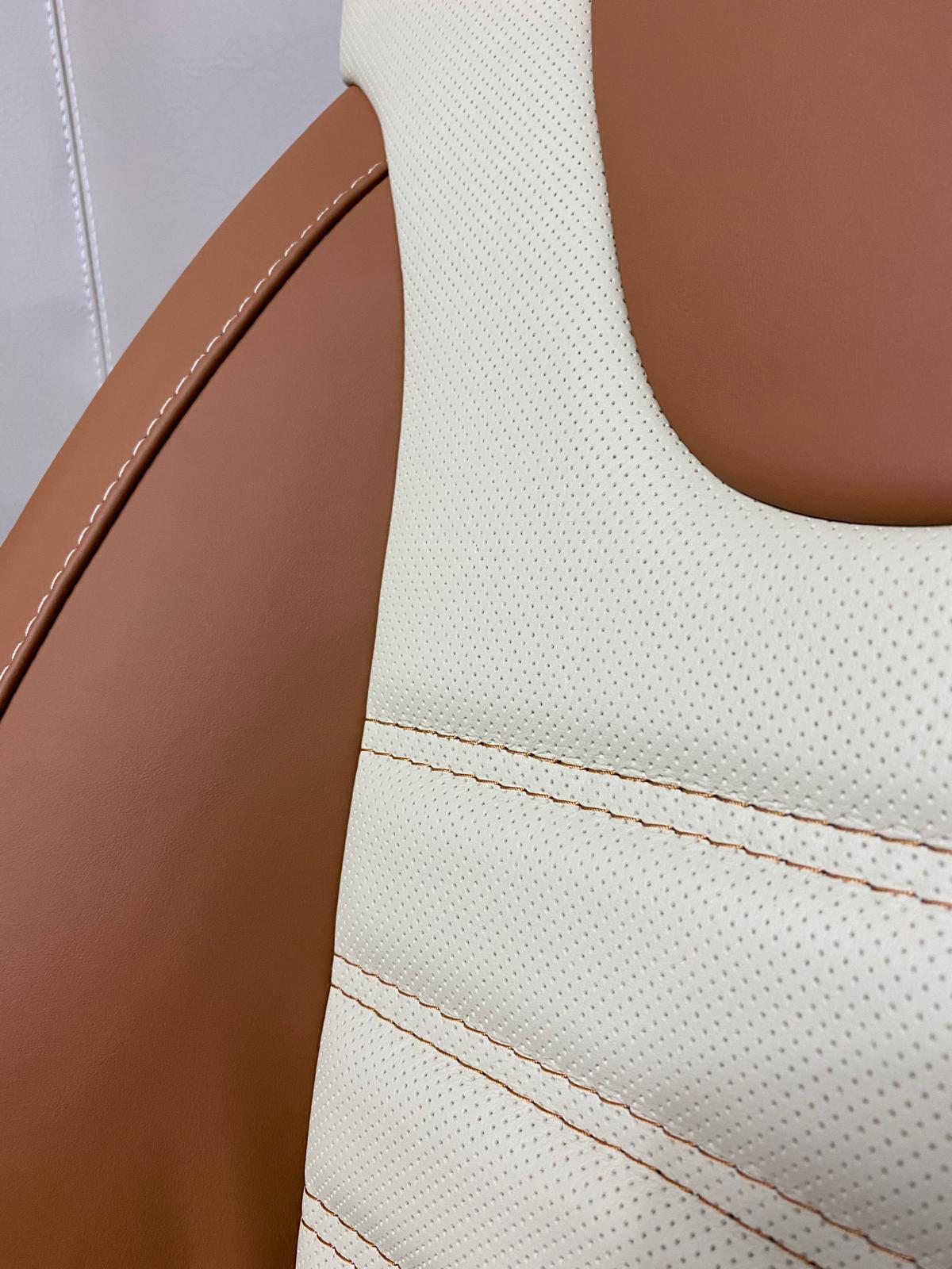 Heated MK4 Replacement Captain Seat close-up, perforated cream centre panel and brown Nappa leather