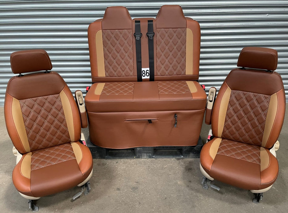 pair of single swivel front seats (86), also matching m1 tested gas assisted rock and roll bed.