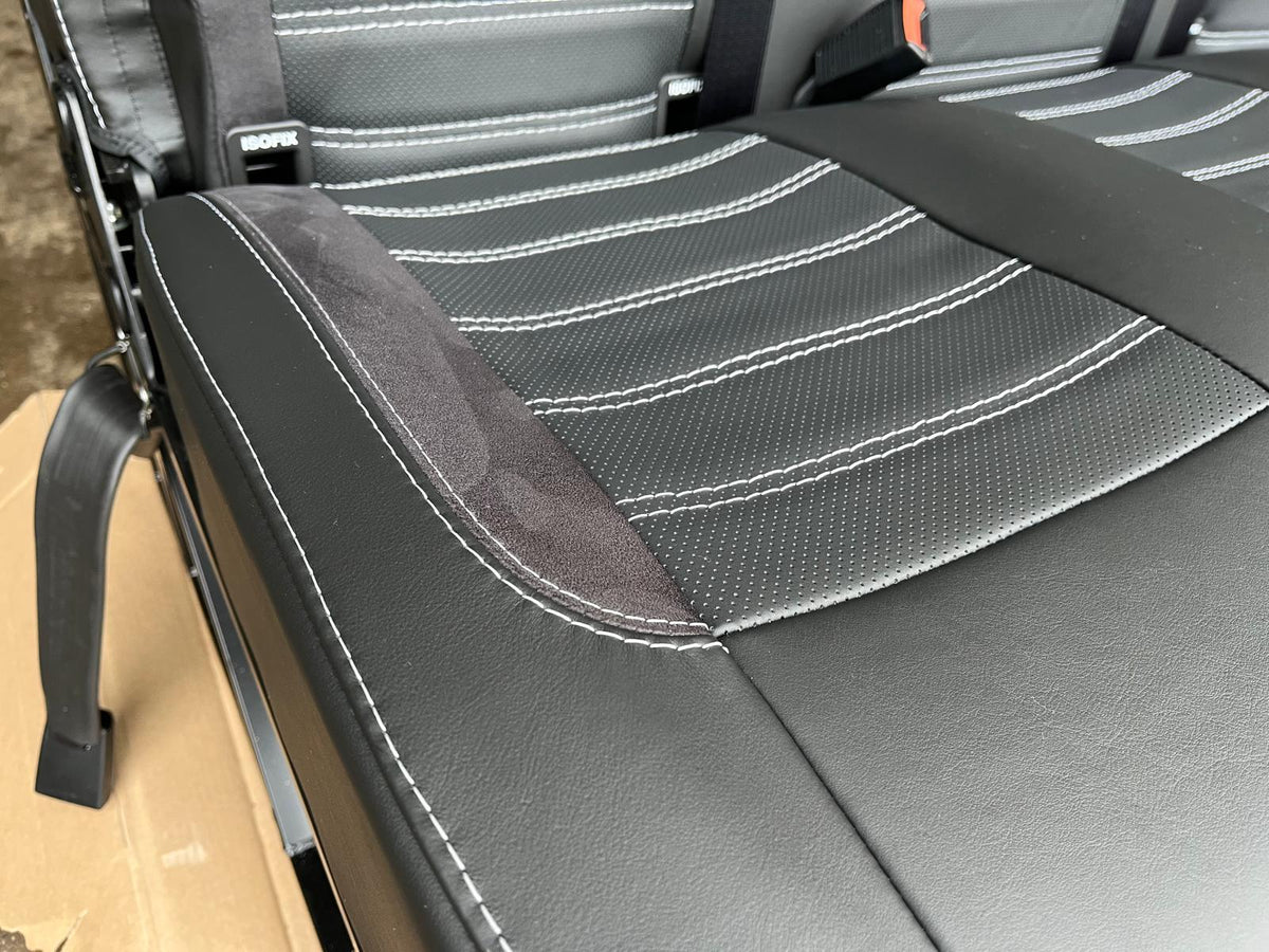RIB Altair 130 with Isofix detailed view of seat base, black Nappa leather, perforated centre panel, black Alcantara insert, light grey stitching.