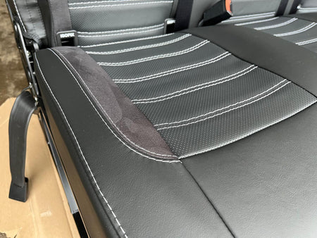 RIB Altair 130 with Isofix detailed view of seat base, black Nappa leather, perforated centre panel, black Alcantara insert, light grey stitching.
