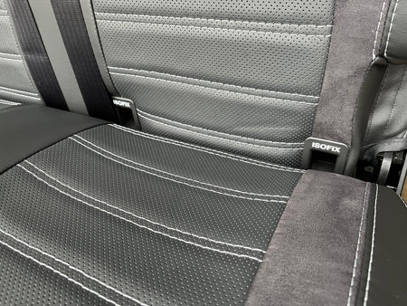 RIB Altair 130 with Isofix close-up, perforated Nappa leather centre panel, Isofix attachment points, black Alcantara insert, light grey stitching.