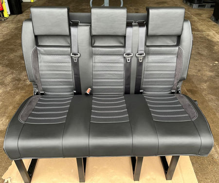RIB Altair 130 with Isofix, black Nappa leather seats with perforated centre panel, black Alcantara inserts, light grey stitching, and integrated seatbelts.