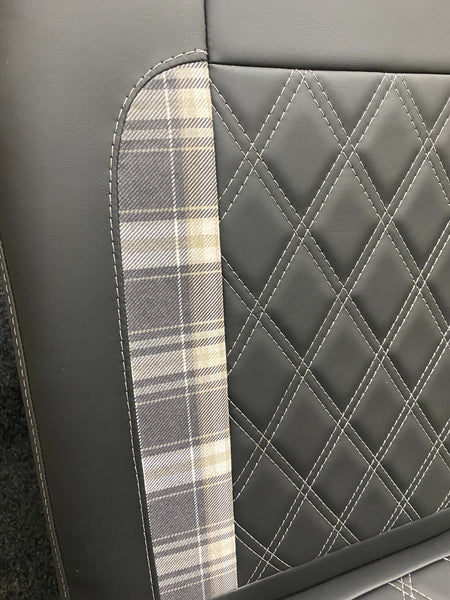 Rock and Roll Bed 3/4 Size M1 Legged Gas Assisted, Close-up of the backrest showing tartan insert and white Bentley cross stitching on black leatherette.