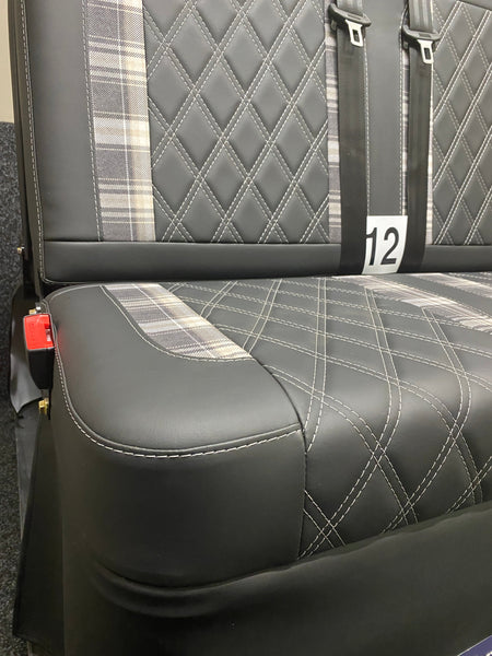 Rock and Roll Bed 3/4 Size M1 Legged Gas Assisted, close-up of seat base and backrest, in black leatherette with tartan inserts and white Bentley cross stitching.