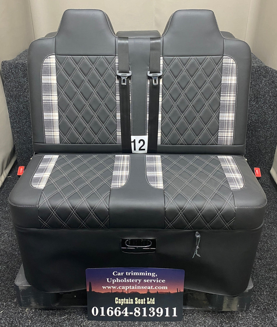 Rock and Roll Bed 3/4 Size M1 Legged Gas Assisted, front view showing black leatherette upholstery with tartan inserts and white Bentley stitch.