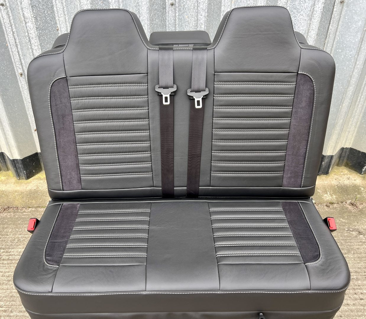 Rock and roll bed 3/4 width Deluxe Legless - 2 Seater - Real Leather M1 gas assisted in black leather with black Alcantara inserts, light grey double horizontal stitching and integrated seatbelts.