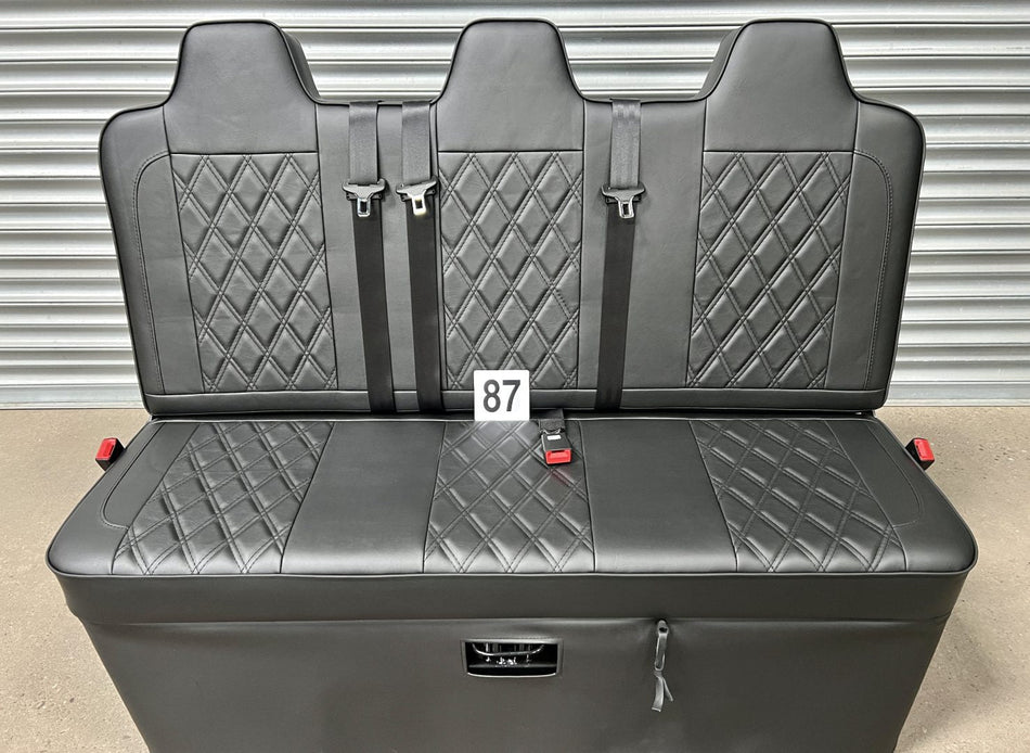 Rock and roll bed full width 3 seater M1 tested gas assisted in black leatherette with Bentley stitching and black piping.