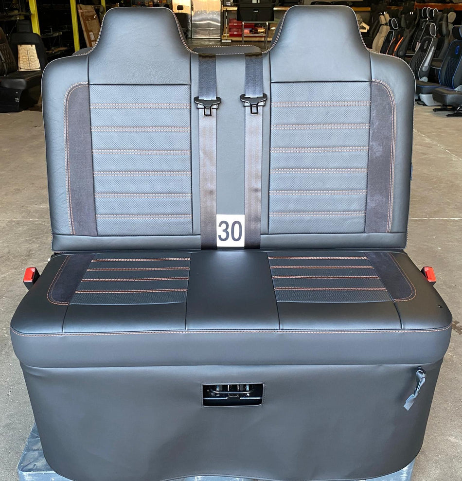 Rock and Roll Bed M1 tested 3/4 Legless gas assisted, black Nappa leather with perforated centre panel, Alcantara inserts, orange stitching, and integrated seatbelts.