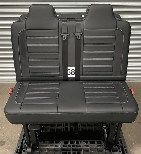 Rock and roll bed M1 tested 3/4 legless gas assisted in black Nappa leather with perforated leather centre panel, black Alcantara inserts, and light grey horizontal stitching.