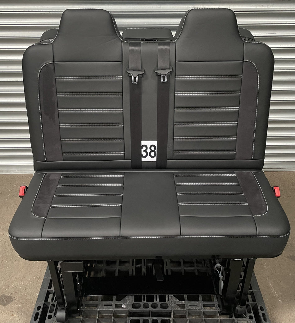 Rock and roll bed M1 tested 3/4 legless gas assisted in black Nappa leather with perforated leather centre panel, black Alcantara inserts, and light grey horizontal stitching.