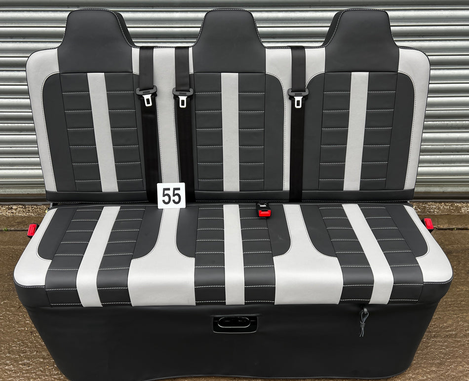 Rock and Roll Bed M1 Tested Gas Assisted Full Width, front view in black leatherette with white edge panels, vertical centre stripes, and horizontal white stitching.