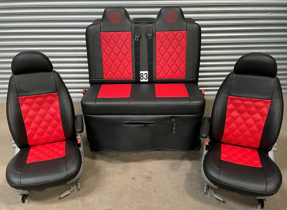 Rock and roll bed M1 tested gas assisted with matching single swivel front seats in matt black leatherette with red centre panels, Bentley cross red stitching and VW logos.