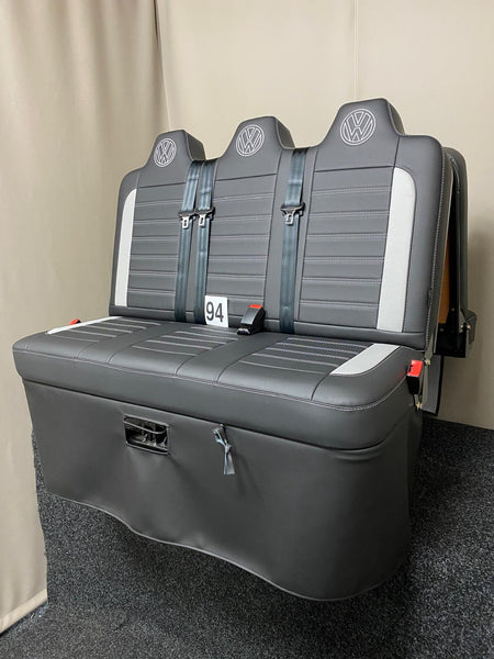 Rock and roll bed Three Seater-gas assisted leisure-120 cm in black leatherette, featuring light grey inserts, Bentley cross stitching in light grey, VW logos on the headrests.