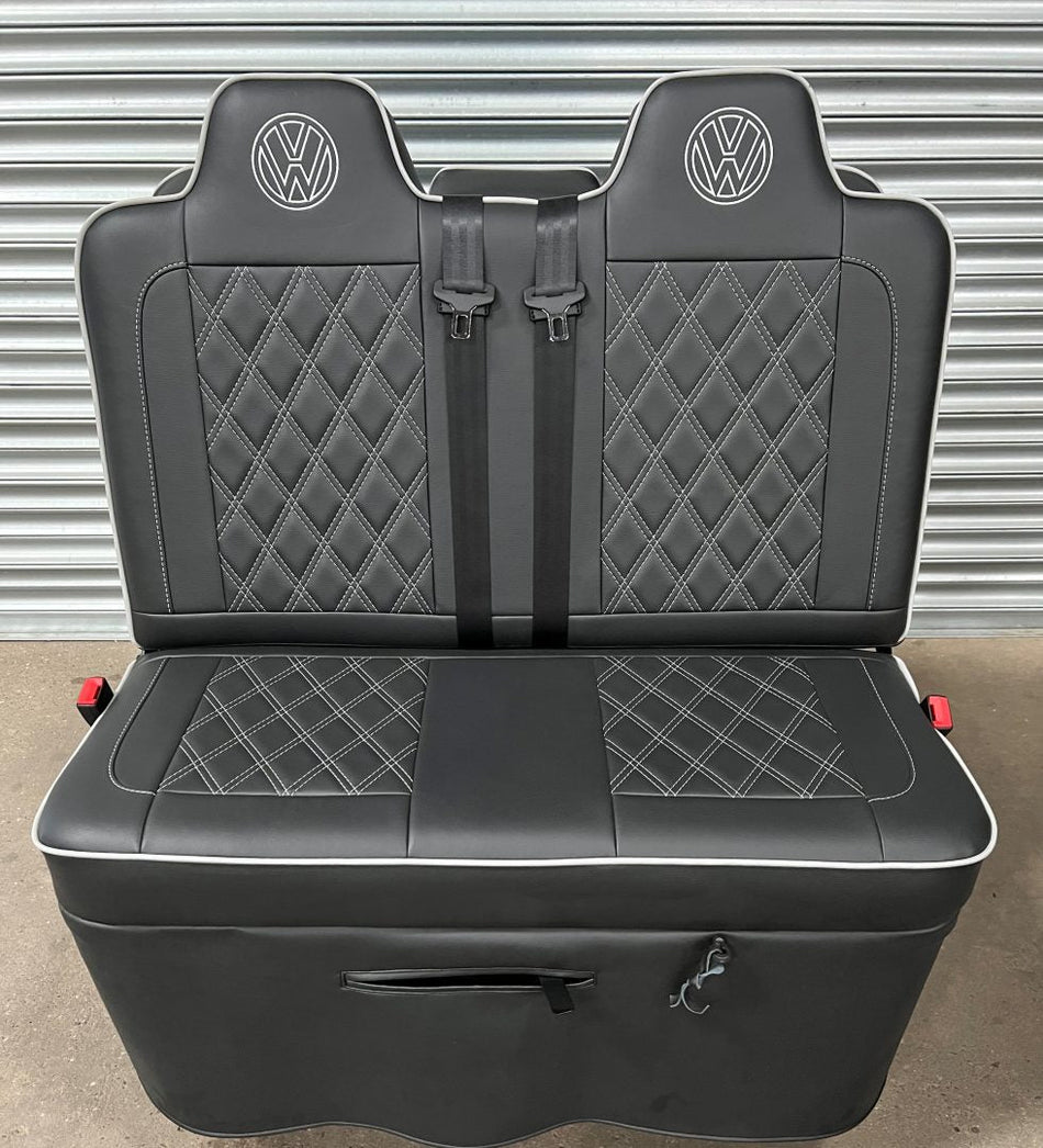 Rock and roll bed VW T4 T5 T6 Crafter M1 tested 3/4 gas assisted in black automotive leatherette with grey piping, Bentley cross stitching and VW logos.