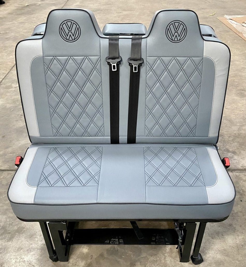 Rock and roll bed VW T4 T5 T6 M1 tested gas strut M1 legged in mid grey leatherette with Bentley cross stitching, light grey edge, black piping and VW logos.