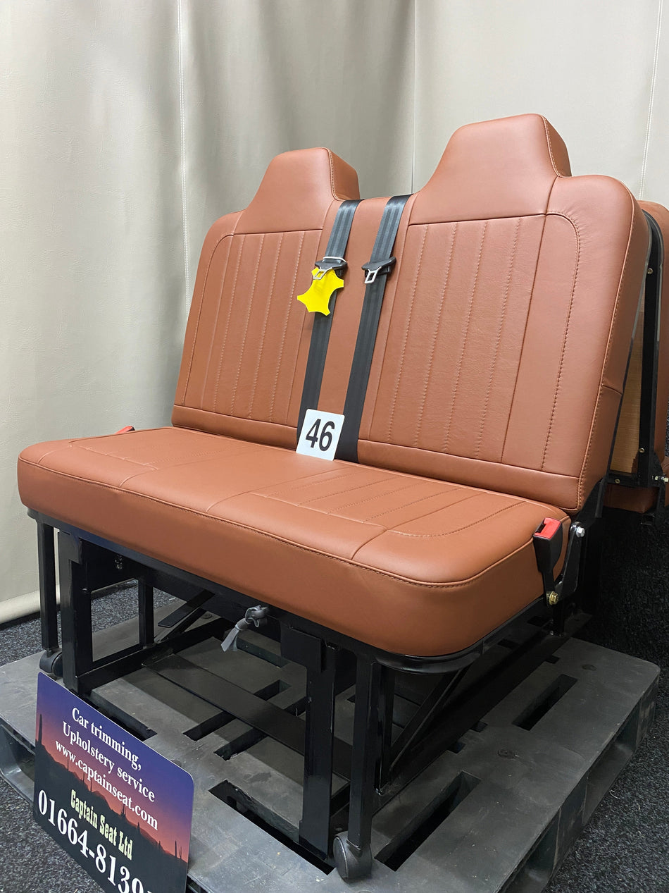 Rock & Roll Bed 3/4 M1 Tested 2 Seater, side angle view of brown real leather seat with vertical stitching and black metal leg frame.