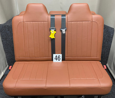 Rock & Roll Bed 3/4 M1 Tested 2 Seater, front view of brown real leather seat with brown vertical stitching.