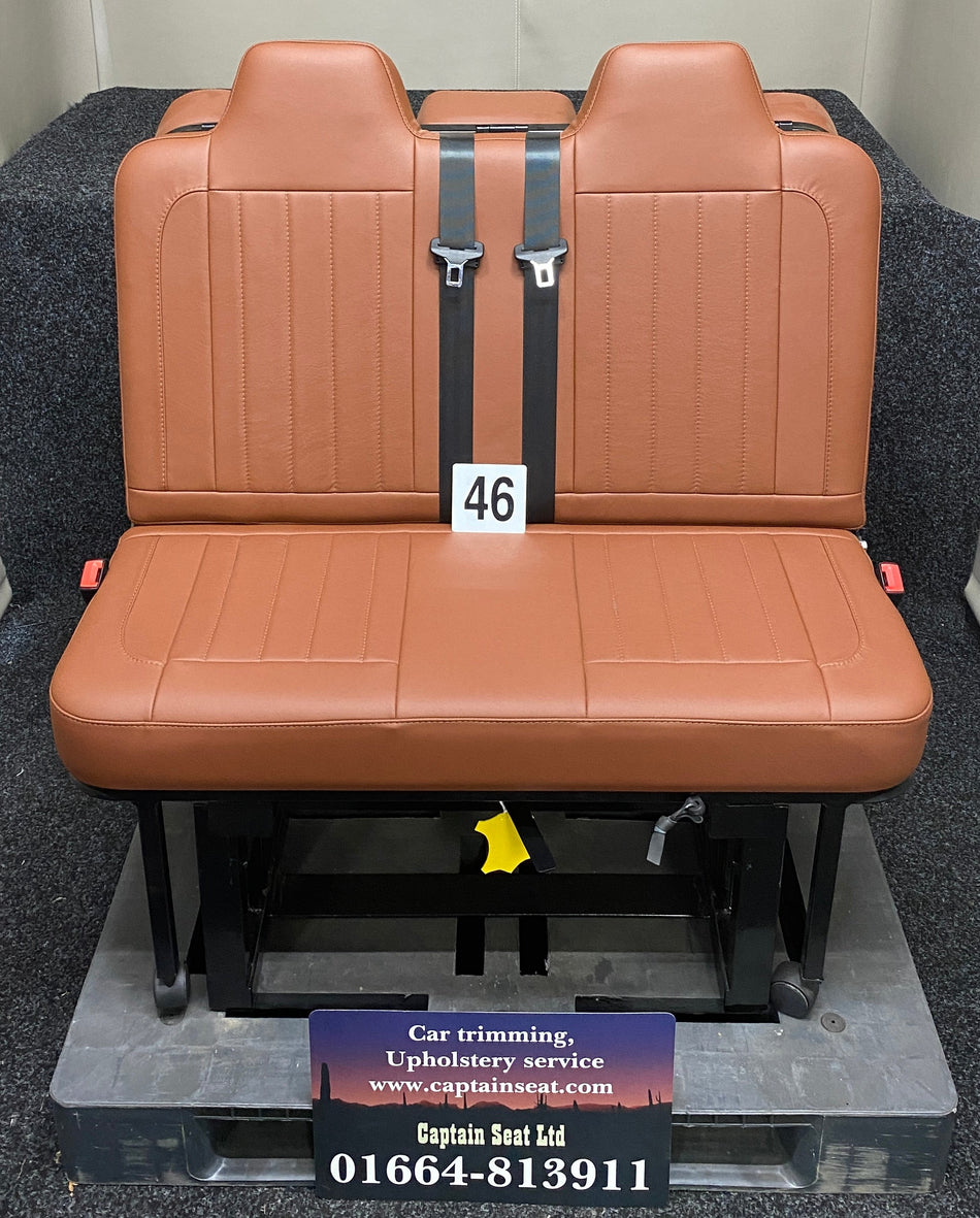 Rock & Roll Bed 3/4 M1 Tested 2 Seater, front view of brown real leather seat with vertical stitching and visible black leg frame.