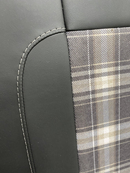 Rock & Roll Bed 3/4 M1 Tested 2 Seater, close-up of tartan centre panel and grey-stitched black leatherette edge detail.